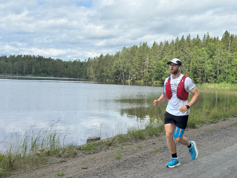 photo of Hollingham jogging beside a lake, courtesy