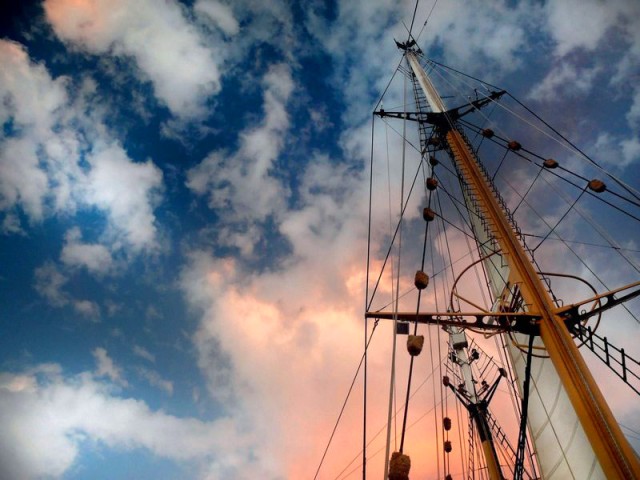 ship mast and cloudy dusk sky, photo by Zena Cardman