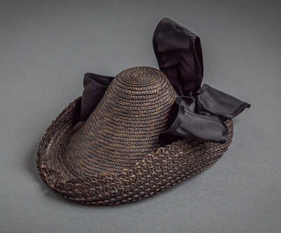 brown woven hat with ribbon from the 1870's photo by Nick Sloff '92 A&A