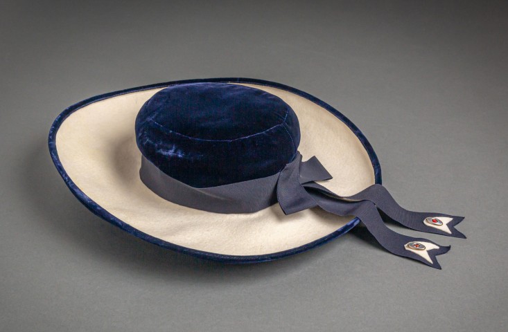 cream brimmed hat with blue top and ribbon from 1960's photo by Nick Sloff '92 A&A