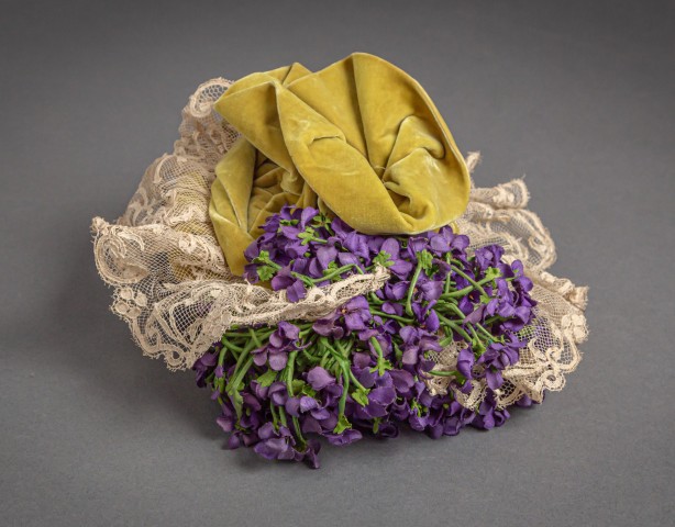 tan and yellow hat with purple flowers from the 1880's photo by Nick Sloff '92 A&A