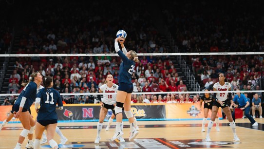 Nittany Lion women's volleyball team on the court, photo by Penn State Athletics