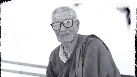 Lonnie Graham's black and white portrait of a Buddhist pilgrim in Zanskar, India