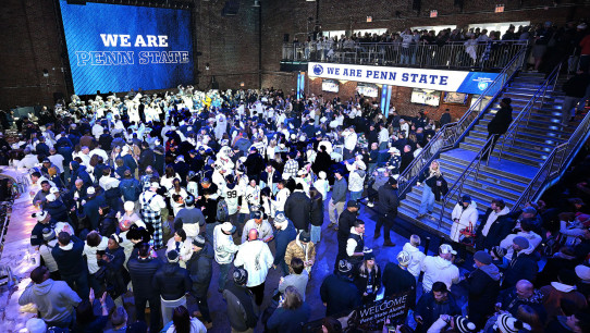 pep rally group photo at a bar near Yankee Stadium before the Pinstripe Bowl, by Penn State Alumni Association