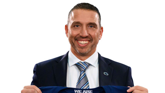 Matt Campbell holding up a Penn State jersey, photo by Mark Selders/Penn State Athletics