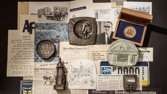 photo of assorted clippings and artificats of the Alumni Association by Cardoni