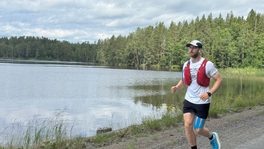 photo of Hollingham jogging beside a lake, courtesy