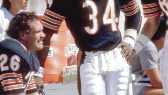 photo of Payton in uniform on sideline via Getty Images