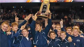 Penn State wrestlers with trophy