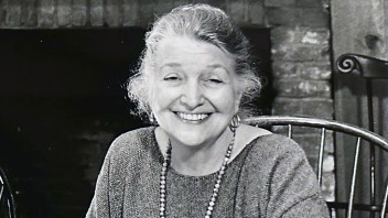 black and white photo of Helen Manfull seated and smiling, courtesy