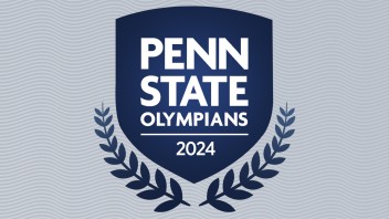 blue crest over blue laurels with Penn State Olympians 2024 in white