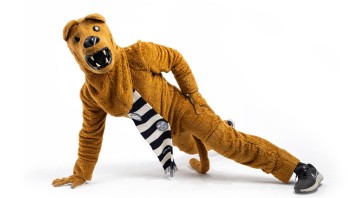 Nittany Lion mascot doing a one-armed pushup, photo by Michael Owen