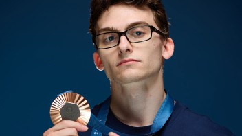 Stephen Nedoroscik holding up his bronze medal, photo by Joe Scarnici/Getty Images