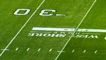 photo of West Shore Home logo on turf at Beaver Stadium by Ryan Jones '95 Com