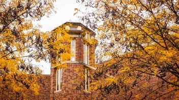 photo of trees yellowing in front of the Classroom Office Building by Nick Sloff '92 A&A