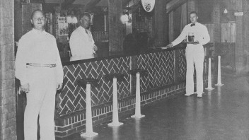 1934 photo of Rathskeller owner C.C. Doggie Alexander and bartenders, Penn Stater Magazine
