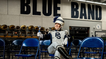 Sheehan seated in Blue Band uniform, photo by Cardoni