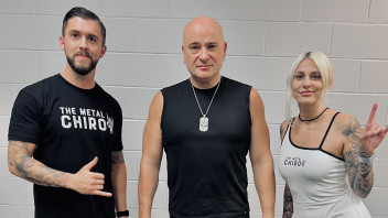 Elle and Kris Biegel with a chiropractic client, courtesy