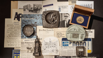 photo of assorted clippings and artificats of the Alumni Association by Cardoni