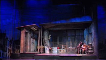 photo of a stage during a performance, courtesy