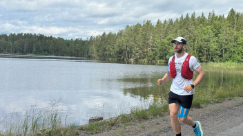 photo of Hollingham jogging beside a lake, courtesy