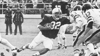 black and white photo of Suhey on the field by Penn State Athletics